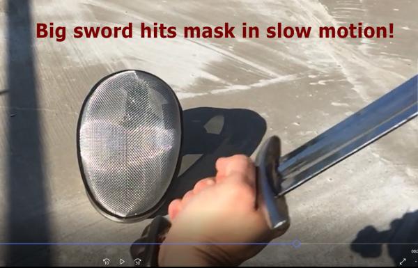 Big sword hits fencing mask in slow motion!